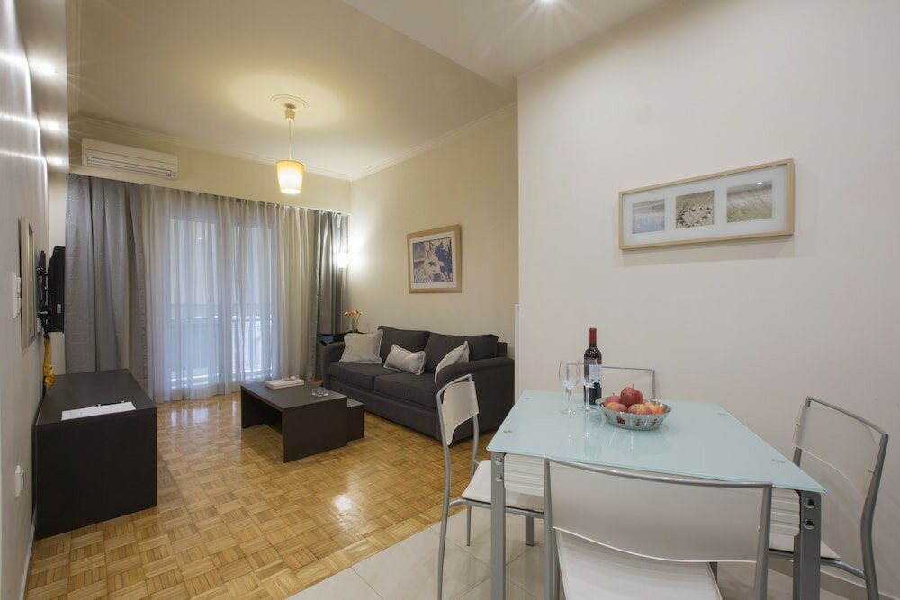 Фото Koukaki Deluxe Apt at Syggrou-Fix