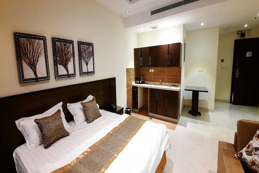 Фото The Blue Rose Hotel - الورده الزرقاء للوحدات السكنيه