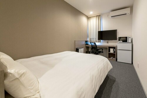 Гостиница Hotel R9 The Yard Kirishimakokubu