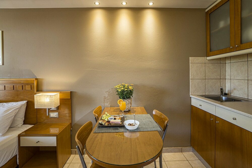 Фото Helios Apartments