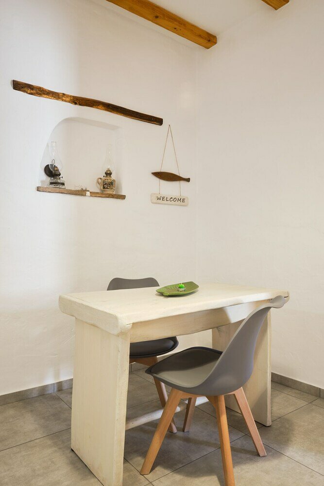 Фото Eressian Lodgings Apartments