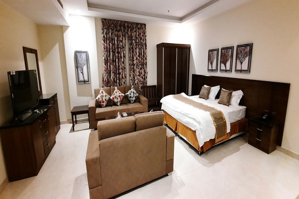 Фото The Blue Rose Hotel - الورده الزرقاء للوحدات السكنيه