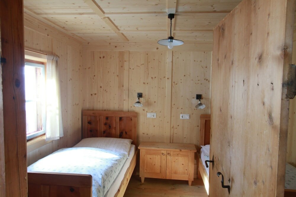 Фото Ferienwohnungen am Berg - Almhütte Alfen