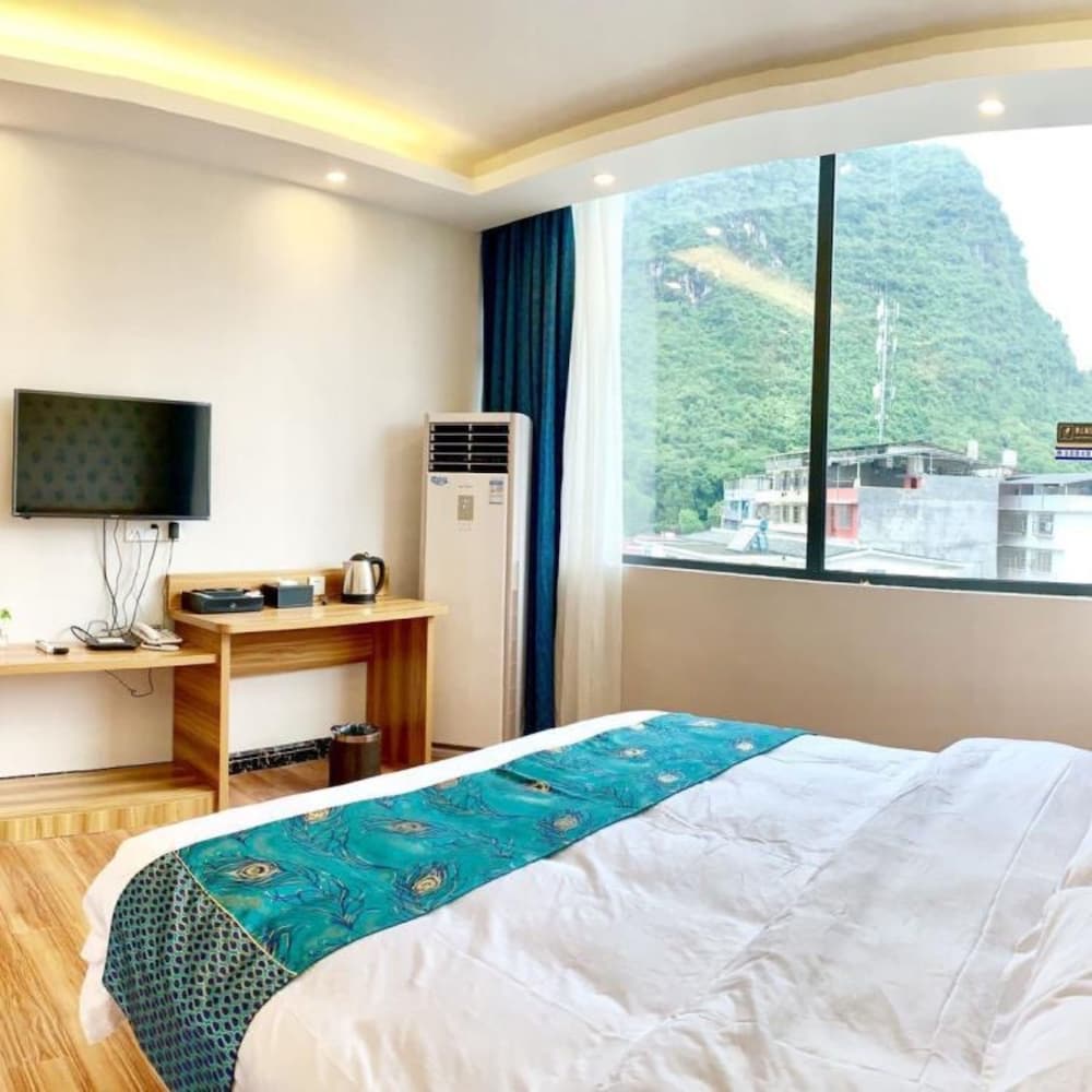 Фото Yangshuo Qingyunge Hotel