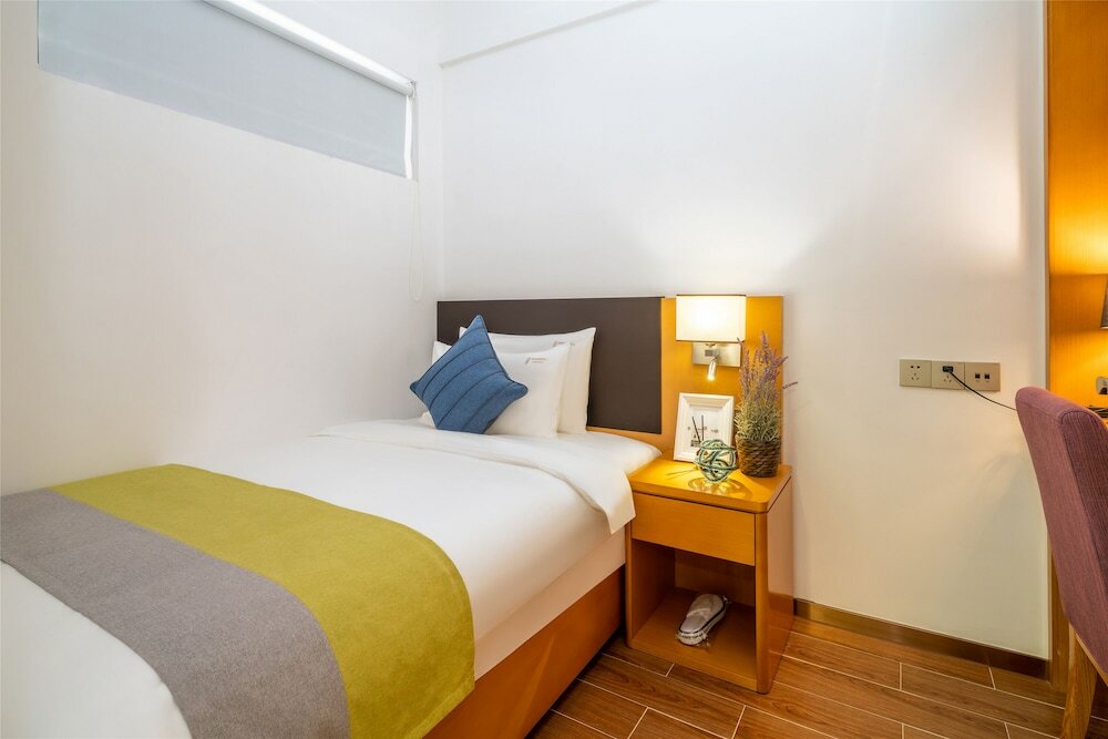 Фото Ding Shang Service Apartment Hotel
