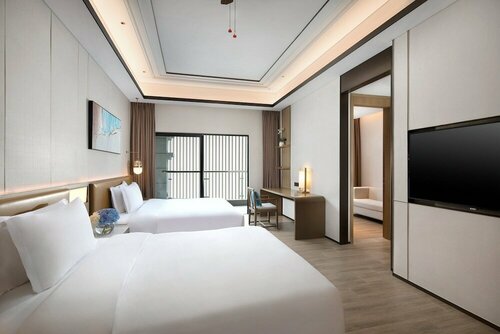 Гостиница Holiday Inn Hotel and Suites Sanya Yalong Bay в Санье