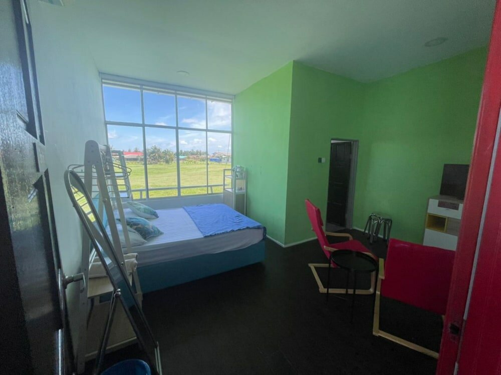 Фото Oyo Home 90370 D'tampi Homestay