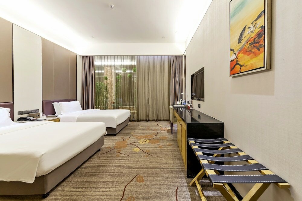 Фото Tianyuan Junlong Hotel