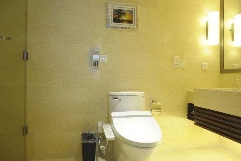 Фото Junyi Wangchao Hotel