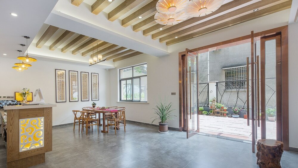 Фото Floral Hotel Red Forest Yuyao