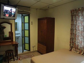 Фото Oyo 615 Dragon Inn Premium Hotel