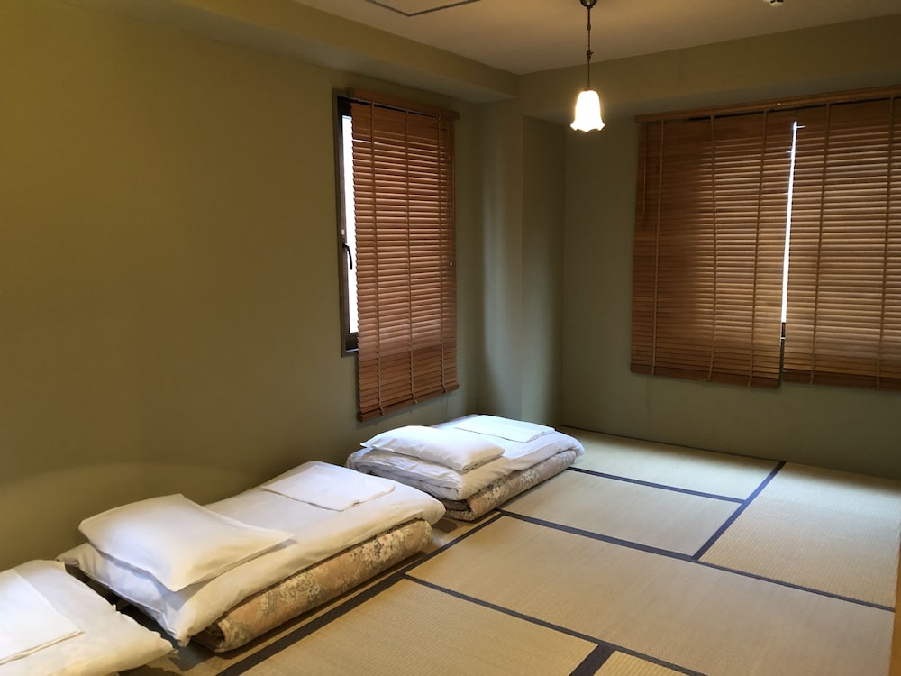 Фото Shimanouchi Luxury Apartment