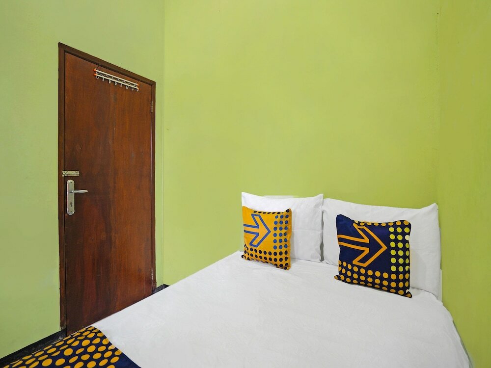 Фото Spot On 91869 Insan Mulia Kost Syariah