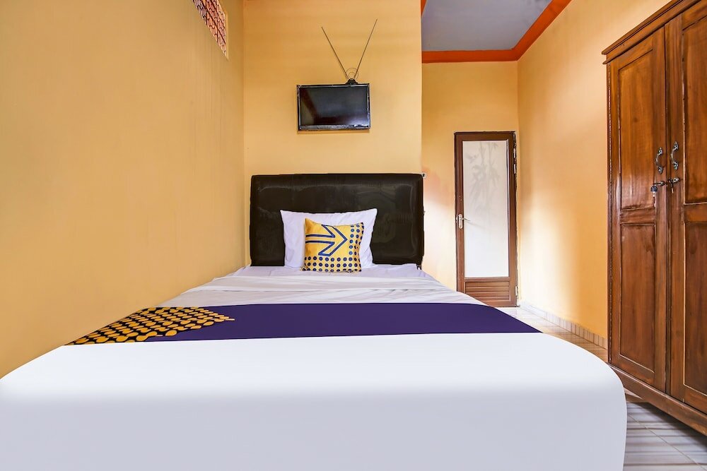 Фото Spot On 90433 Serasi Kost