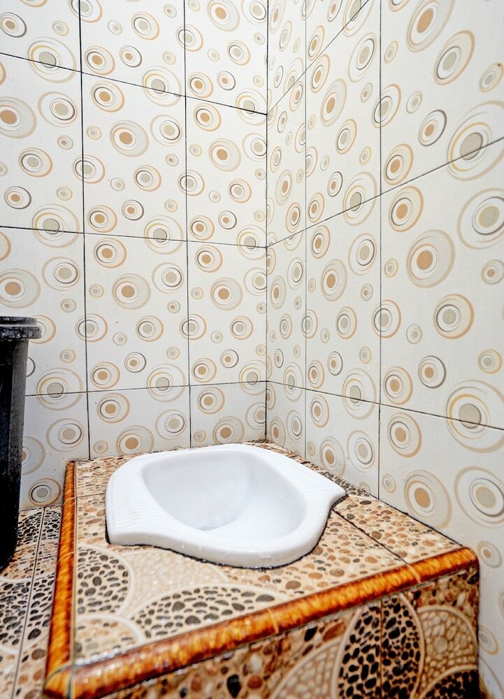 Фото Spot On 92527 Penginapan Kangean Syariah