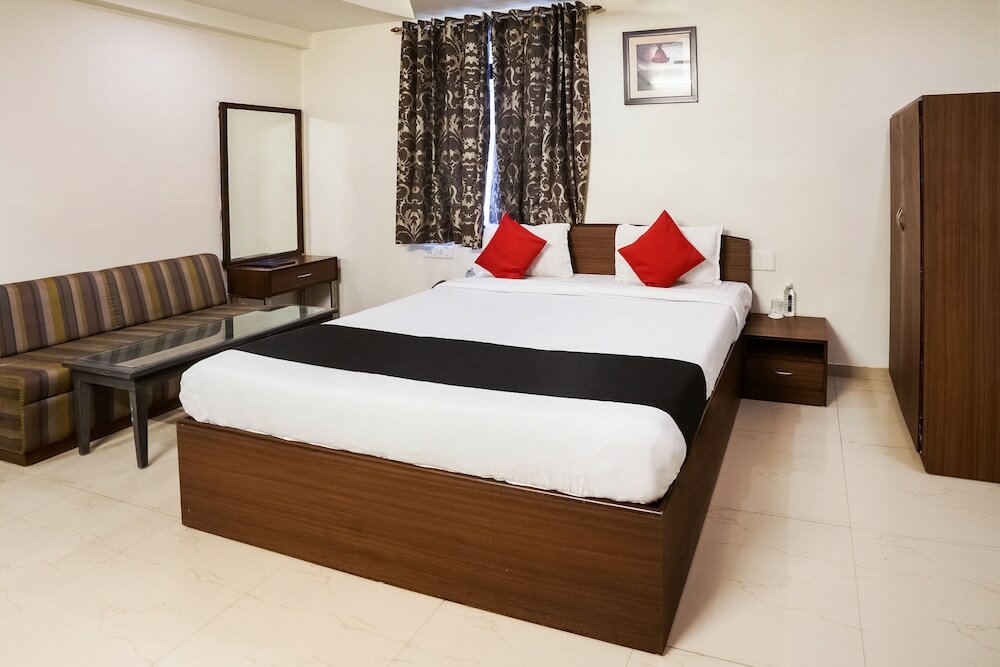 Фото Capital O 48482 Hotel Tribecca Inn