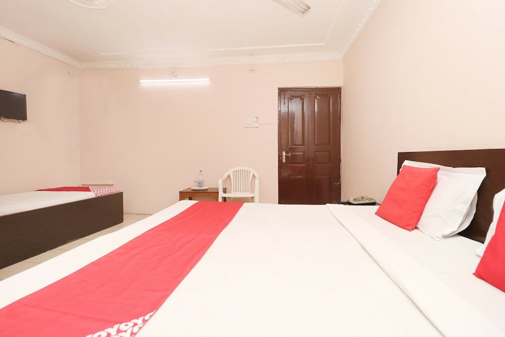 Фото Oyo 30274 Temple City Guest House