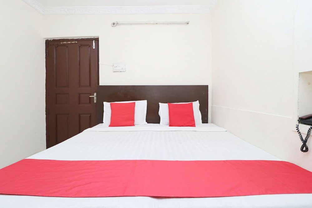 Фото Oyo 30274 Temple City Guest House