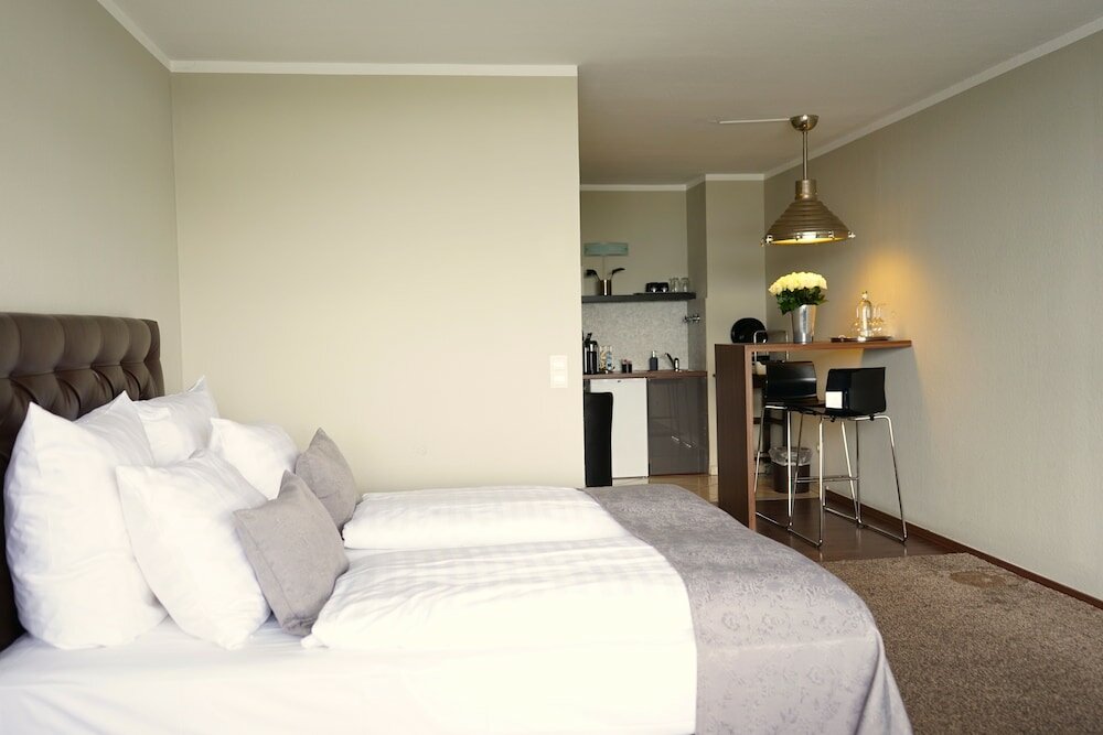 Фото Rheinblick Appartments