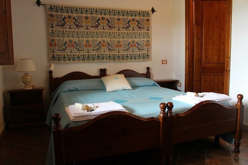 Фото Agriturismo i Mandorli