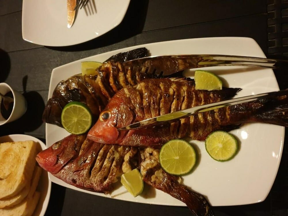 Фото Thoddoo Beach Holiday Inn