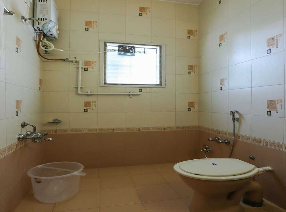 Фото Oyo 10031 Wind Chimes Boutique Guest House