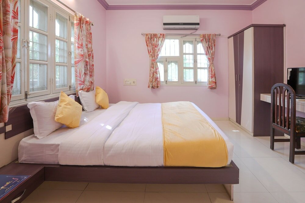 Фото Oyo 10031 Wind Chimes Boutique Guest House