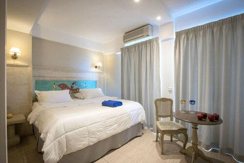 Гостиница Parthenis Beach Suites by the Sea