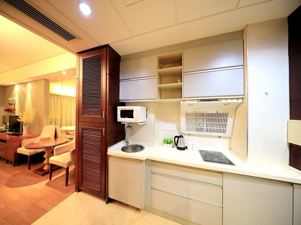 Фото Nanchang Honggutan Taili Apartment