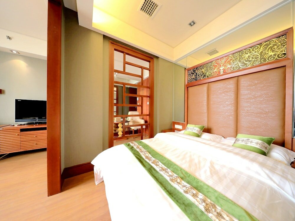 Фото Nanchang Honggutan Taili Apartment