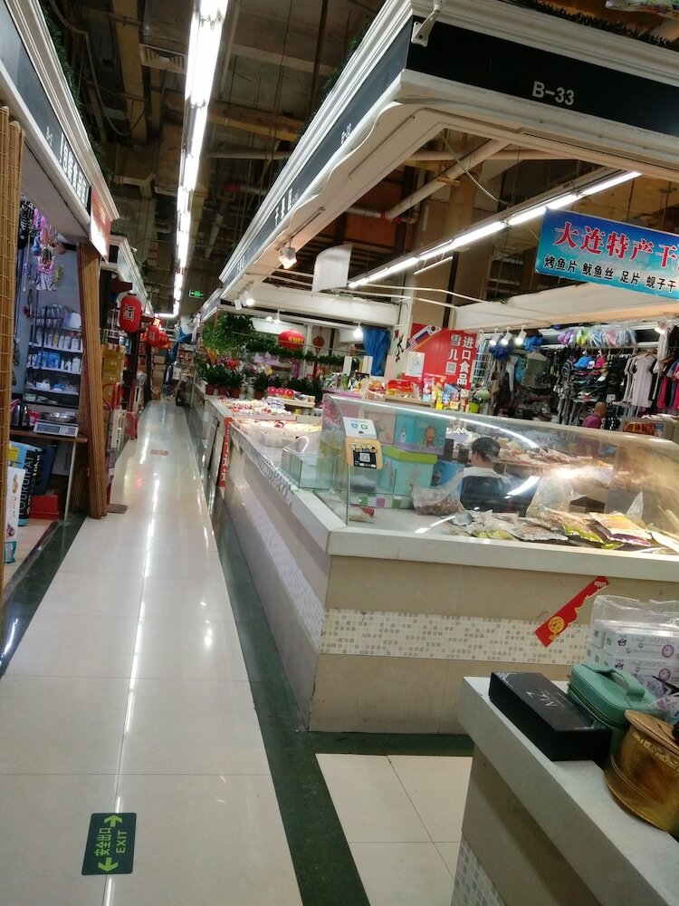 Фото Dalian Xiuzhu Building Apartment