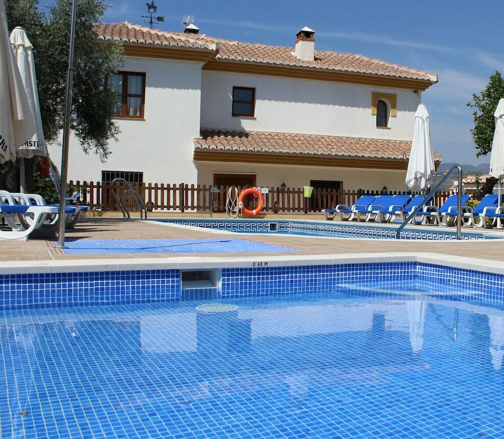 Фото Hostal y Apartamento Rural Los Naranjos