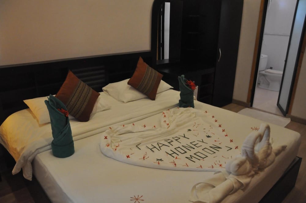 Фото Rasdhoo Coralville Hotel