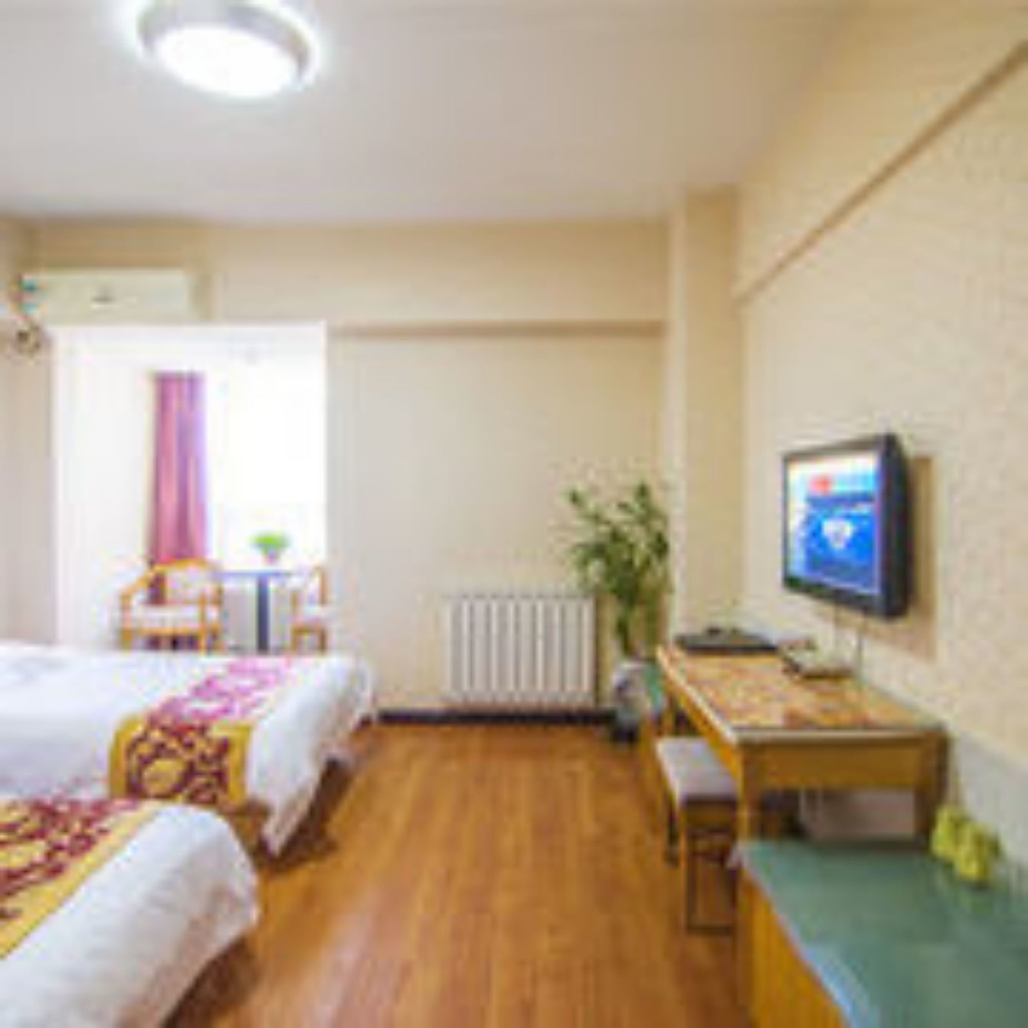 Фото Xian Golden Tree Business Hotel