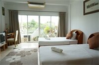 Фото Corner Cafe Bed and Breakfast