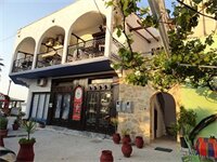 Фото Captain's Beach Boutique Apartments