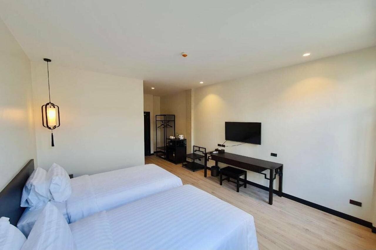 Фото Old Thai Heng Hotel