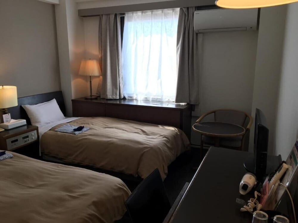 Фото Kanku Hotel Sunplus Yutaka