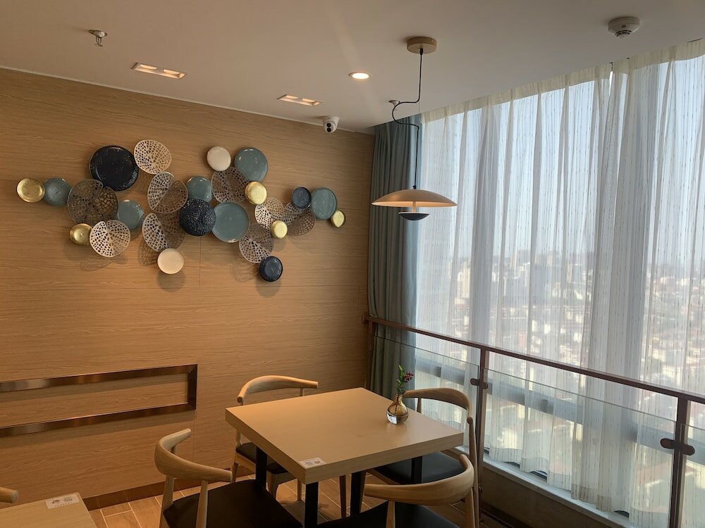 Фото Joysuites Nantong