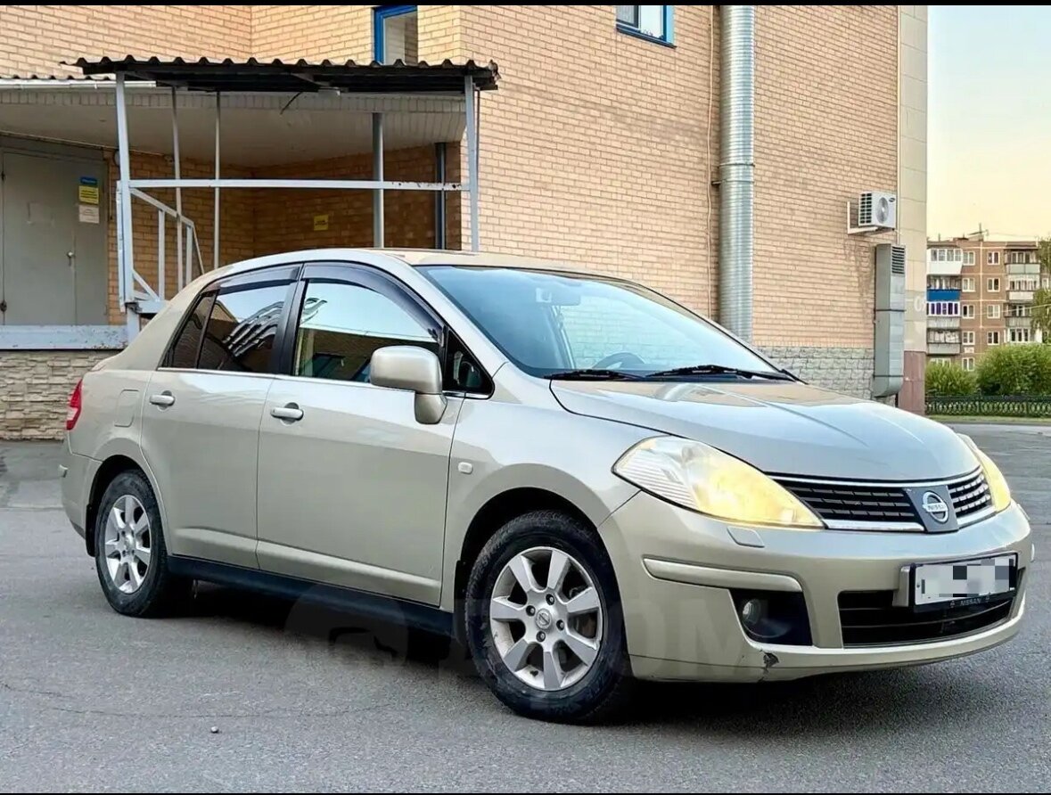 Nissan Tiida - 4 от автора Евгения в Бортжурнале