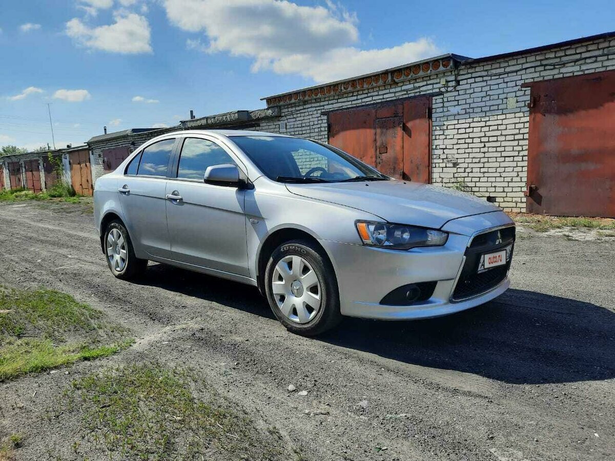 Отзыв владельца автомобиля Mitsubishi Lancer 2011 года ( X