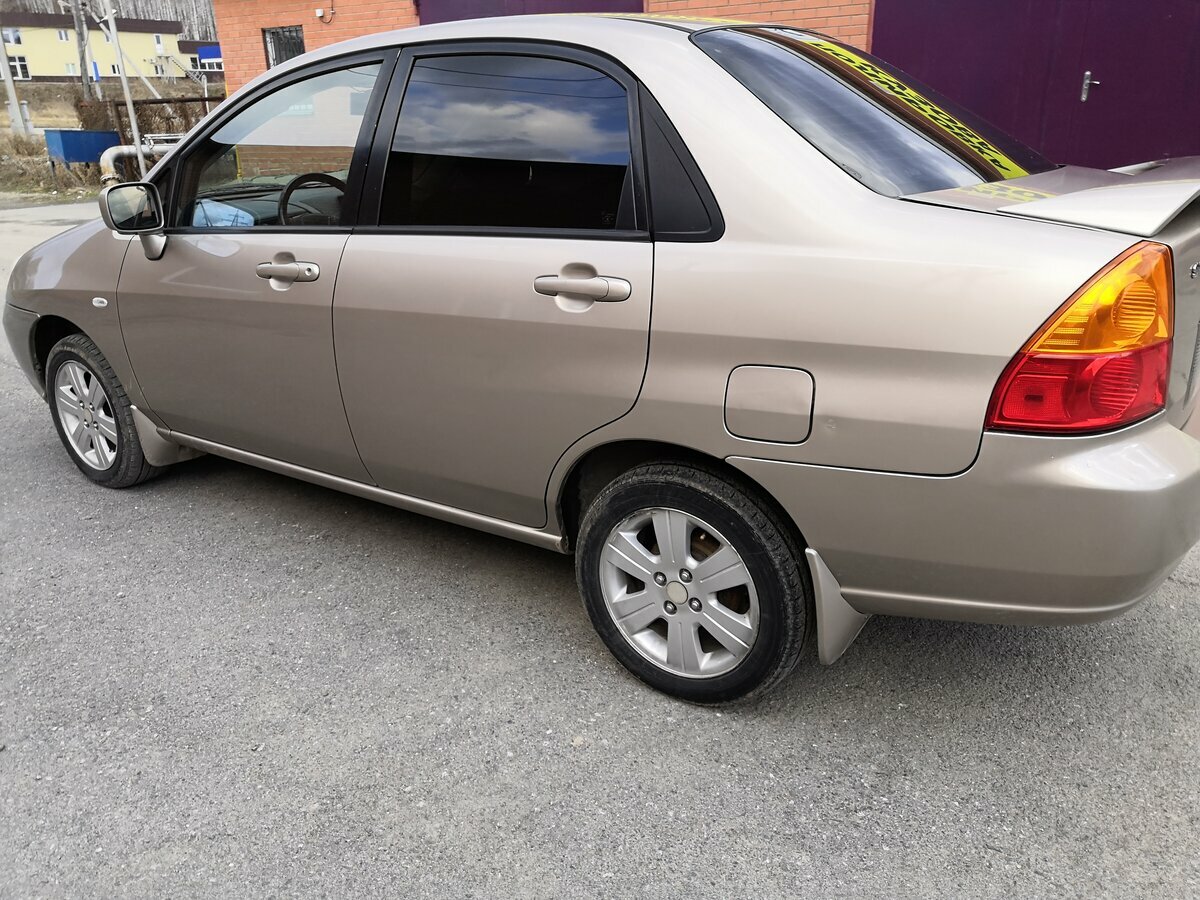 Suzuki Liana - 6 от автора Чёрный внедорожник в Бортжурнале