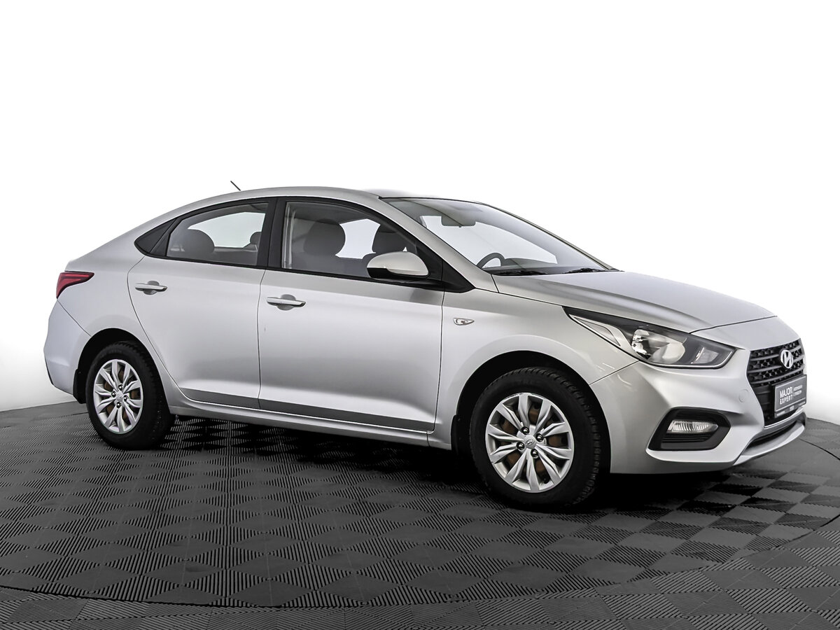 Купить б/у Hyundai Solaris I Рестайлинг 1.6 AT (123 л.с.) бензин автомат в Москв
