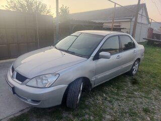 2007 Mitsubishi Lancer IX Рестайлинг, серебристый, 230000 рублей, вид 1