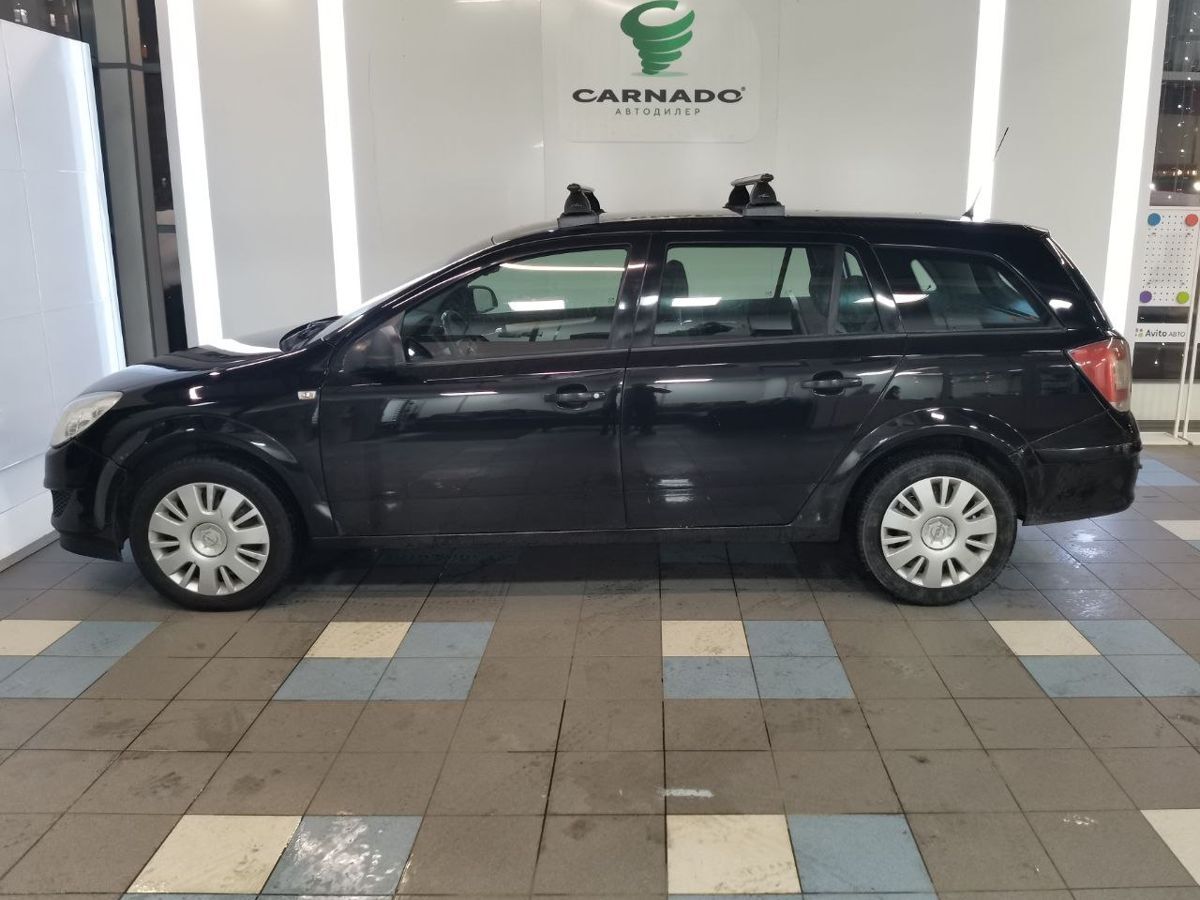 Opel Astra, 2011 год