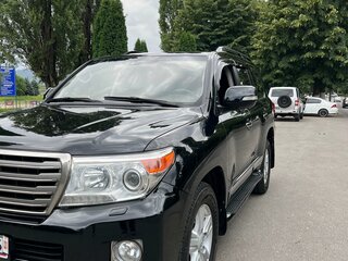 2014 Toyota Land Cruiser 200 Series Рестайлинг 1, чёрный, 3300000 рублей, вид 1