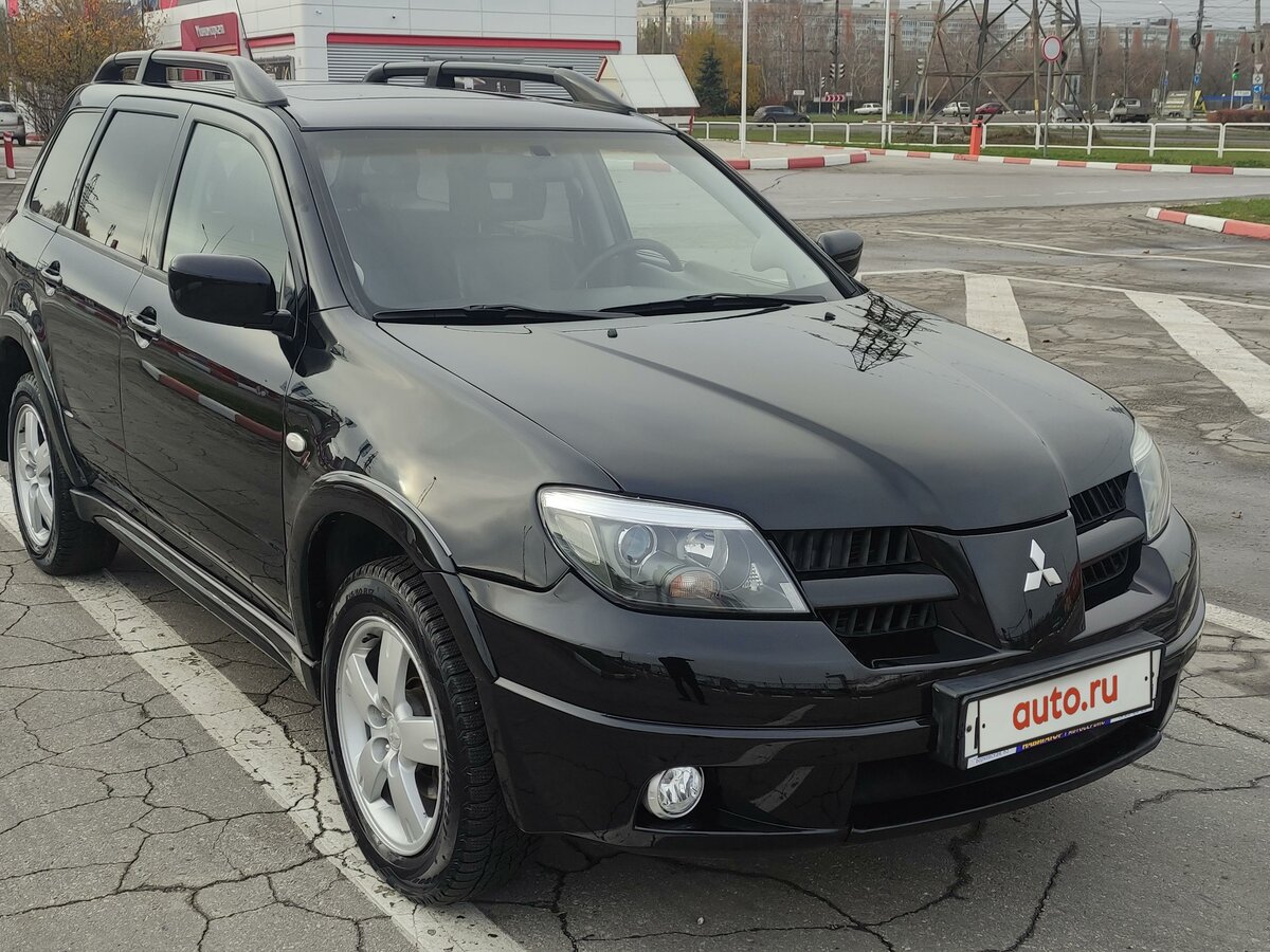 Купить б/у Mitsubishi Outlander I 2.4 AT (160 л.с.) 4WD бензин автомат в Тольятти: чёрный ...