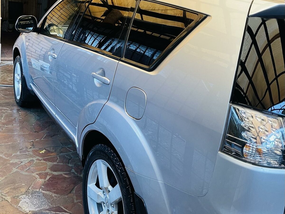 Купить б/у Mitsubishi Outlander II 3.0 AT (220 л.с.) 4WD бензин автомат ...