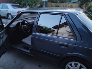 Купить б/у Mazda 626 II (GC) 1.6 MT (80 л.с.) бензин механика в