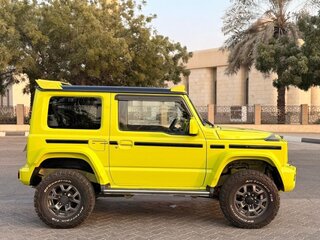 2021 Suzuki Jimny Sierra IV, жёлтый, 1700055 рублей, вид 3